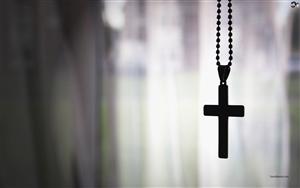 A Holy Cross pendant